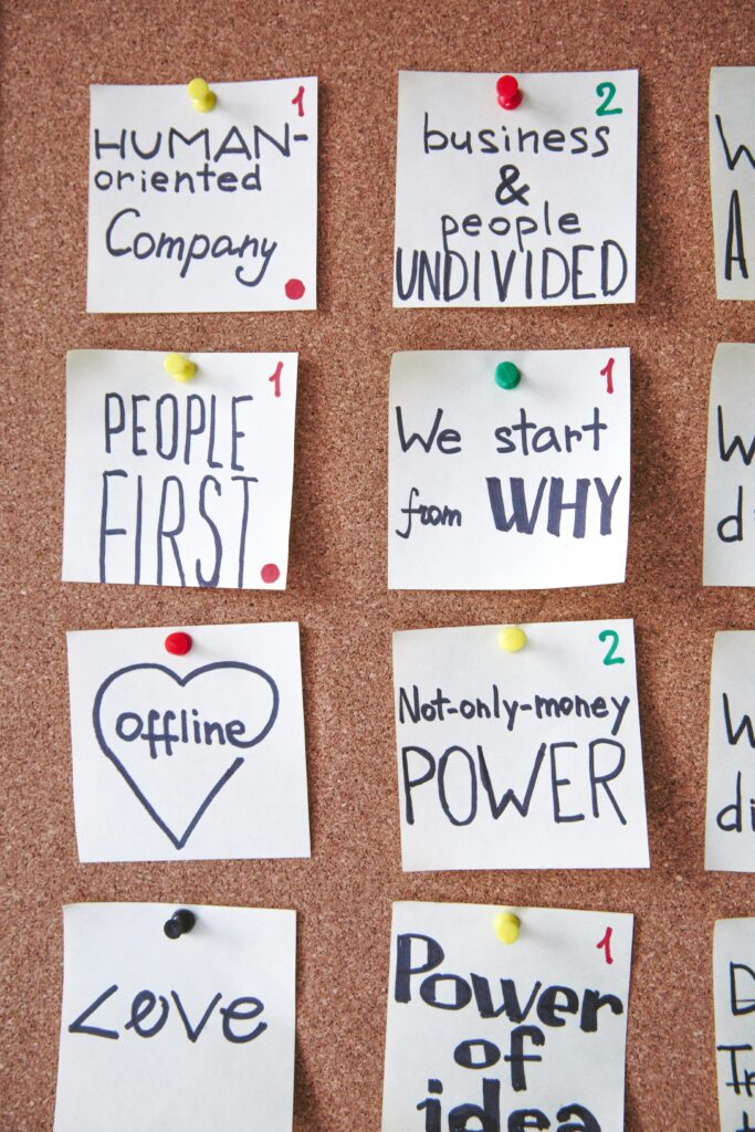 pexels-photo-3782139-3782139 Collection of inspiring handwritten notes pinned on a corkboard to boost business creativity.